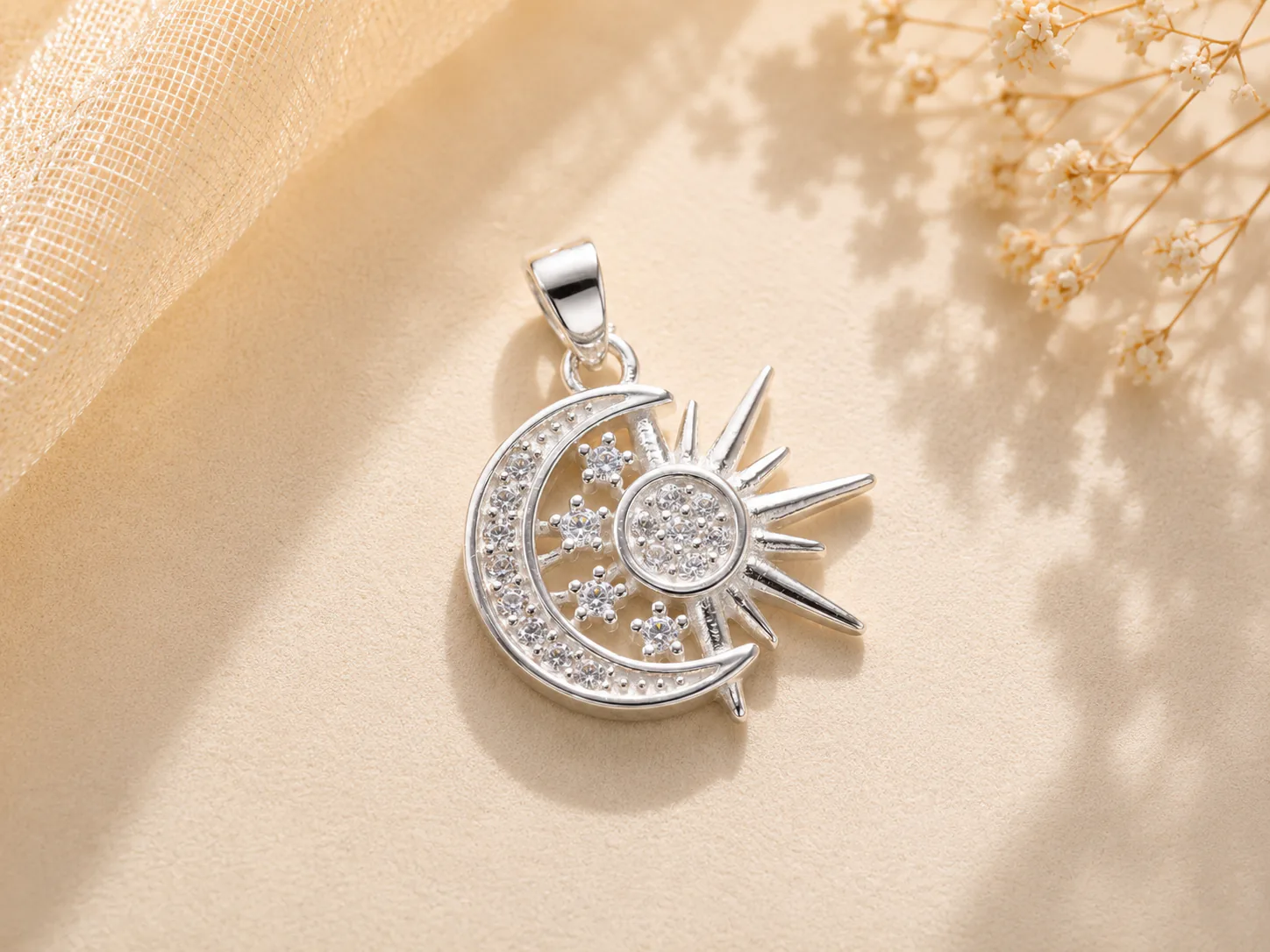 Celestial sun and moon silver pendant