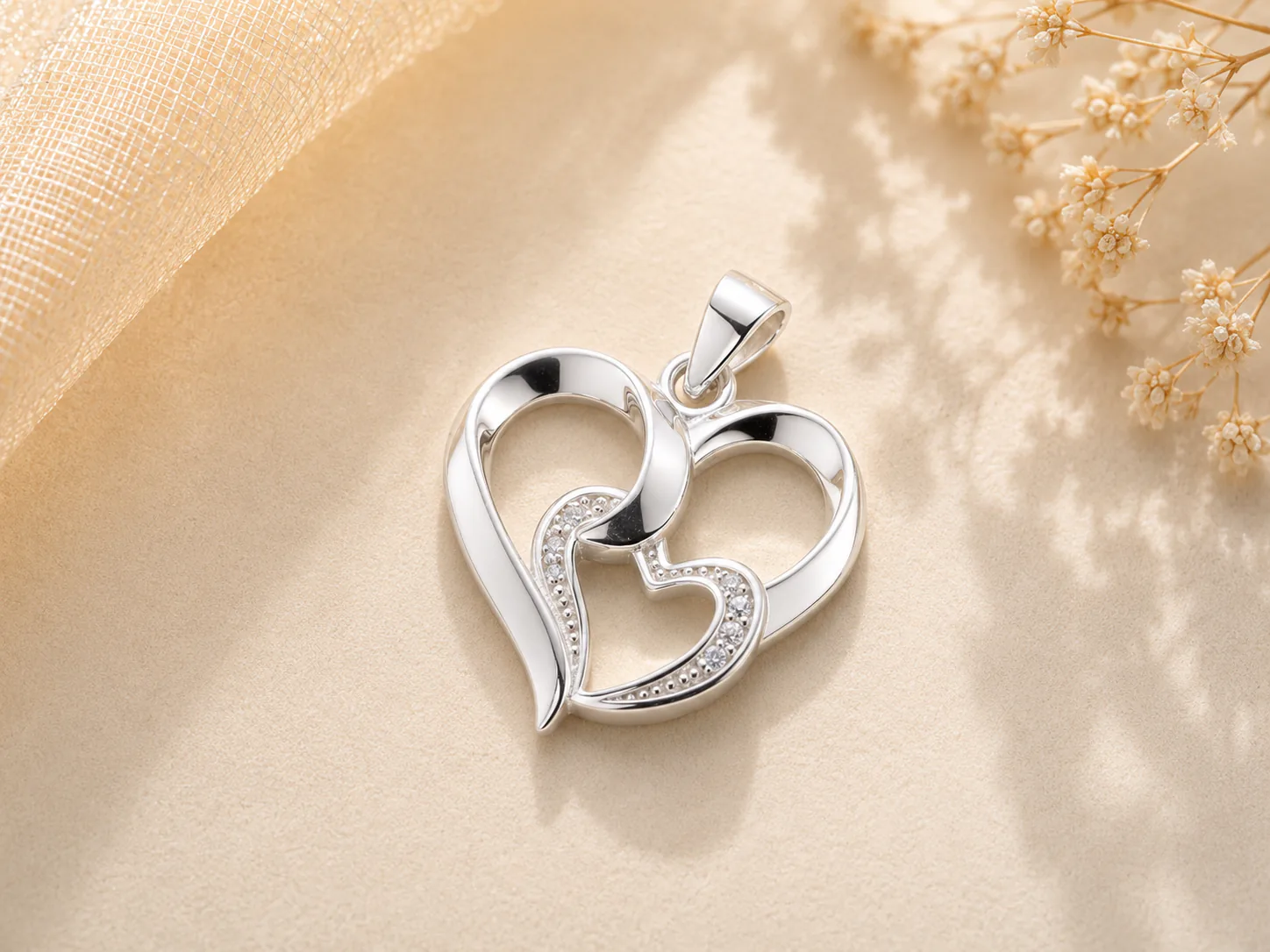Interlocking double heart silver pendant