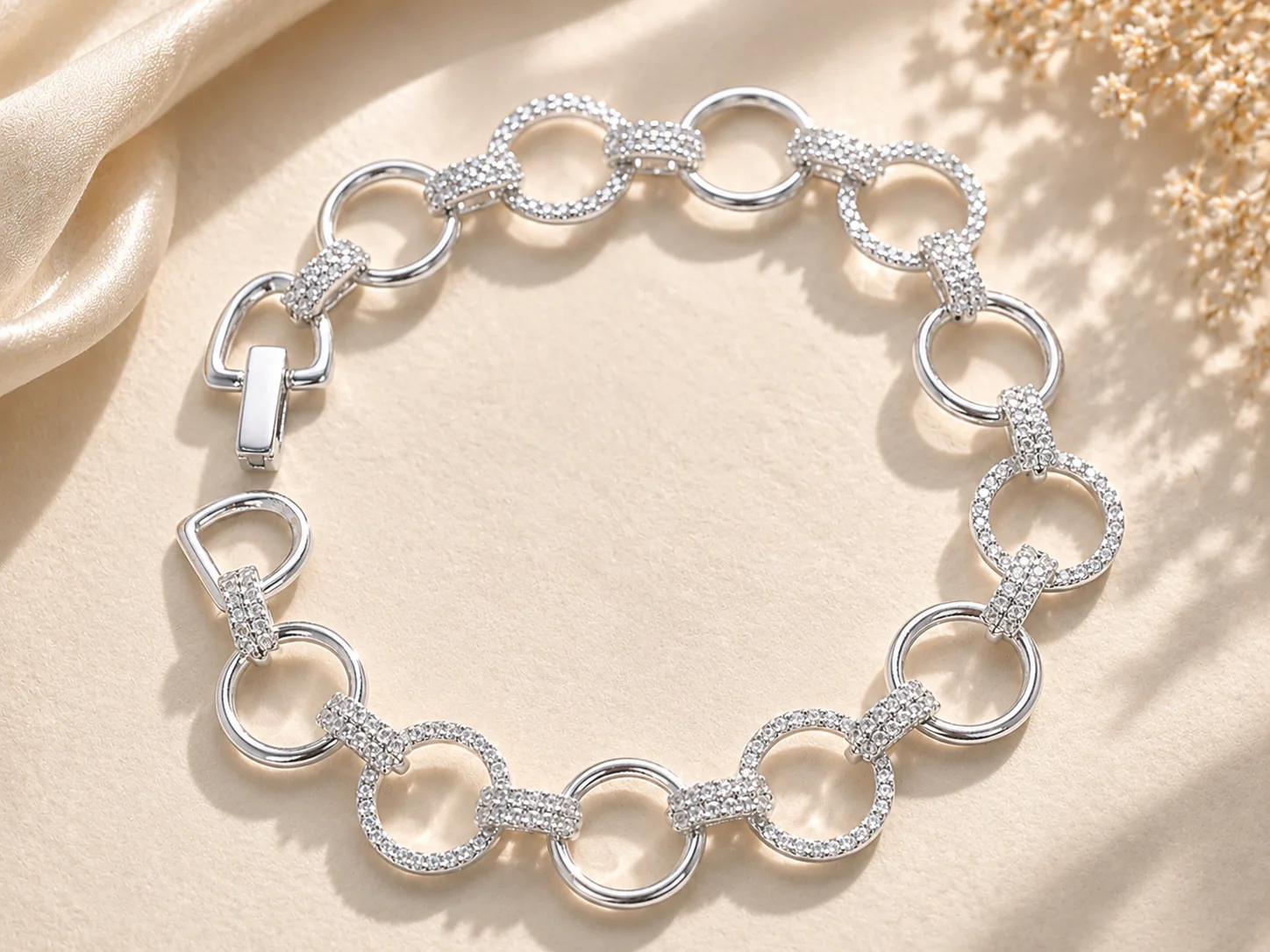 Silver bracelet with alternating polished and pavé circle links