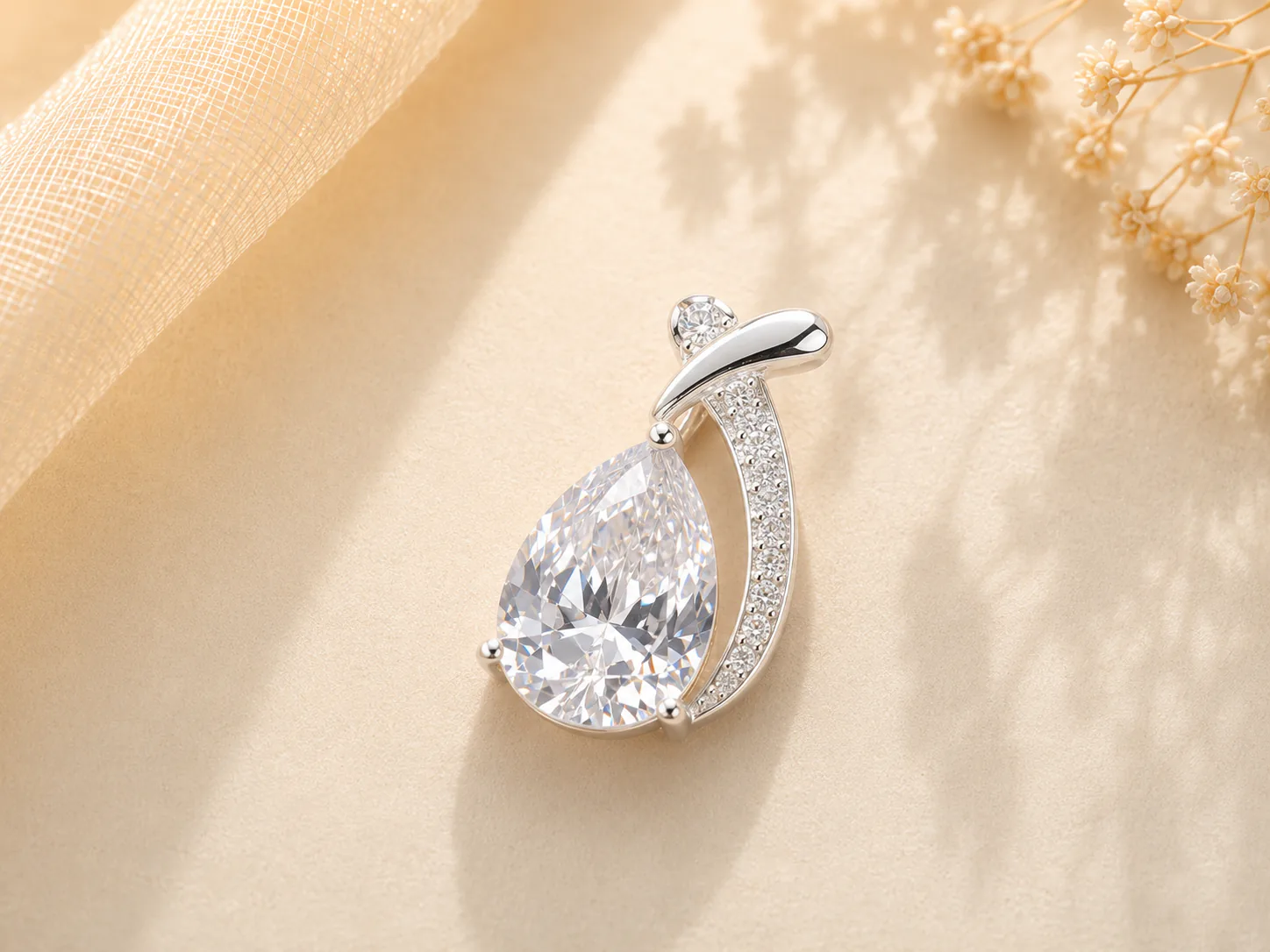 Pear-cut clear stone silver pendant