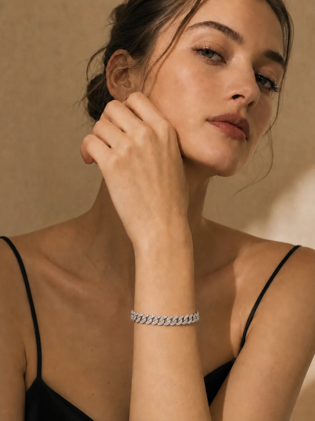 Model wearing an 8 mm pavé silver Cuban link bracelet