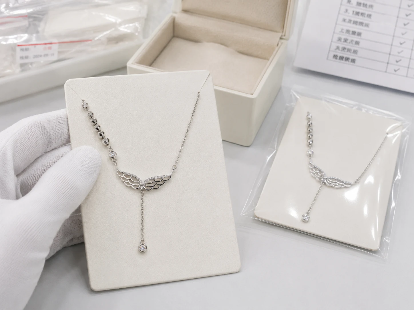 Silver necklace sample inspection and packaging preparation